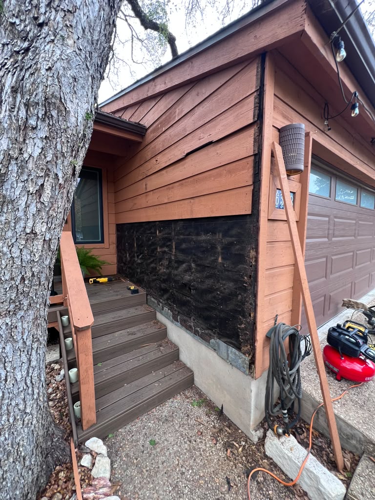 Exterior siding replacement in progress, Central Texas
