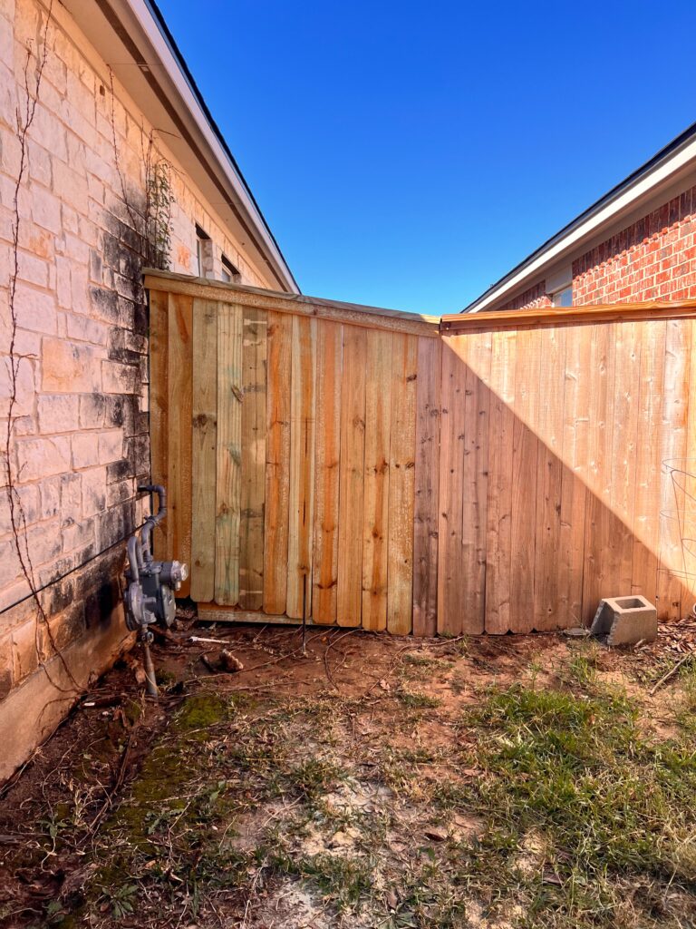 New cedar fence panel installed near Elgin, TX